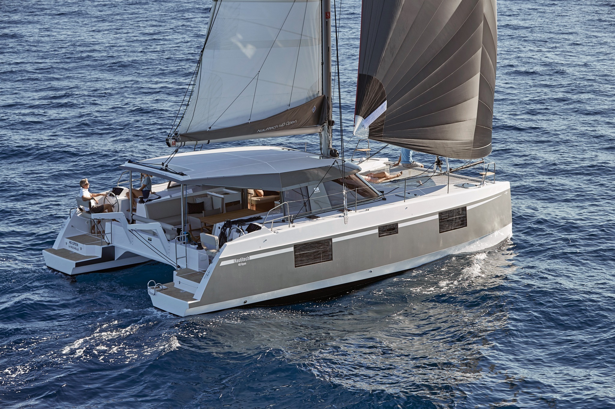 Catamaran sailing on open sea during the delivery and reporting stage